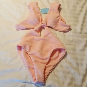 Pink one-piece swimsuit